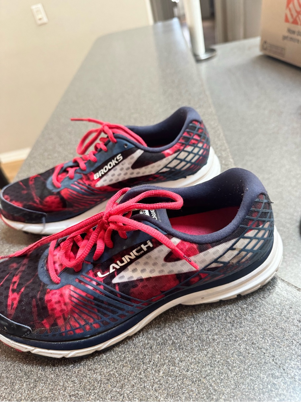 Brooks Launch Women's Running Sneakers in red and Navy